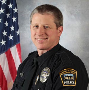 This photo provided by the University of Colorado at Colorado Springs shows officer Garrett Swasey, who was killed in a shooting at a Planned Parenthood clinic in Colorado Springs, Colo., Friday, Nov. 27, 2015. (University of Colorado at Colorado Springs via AP)