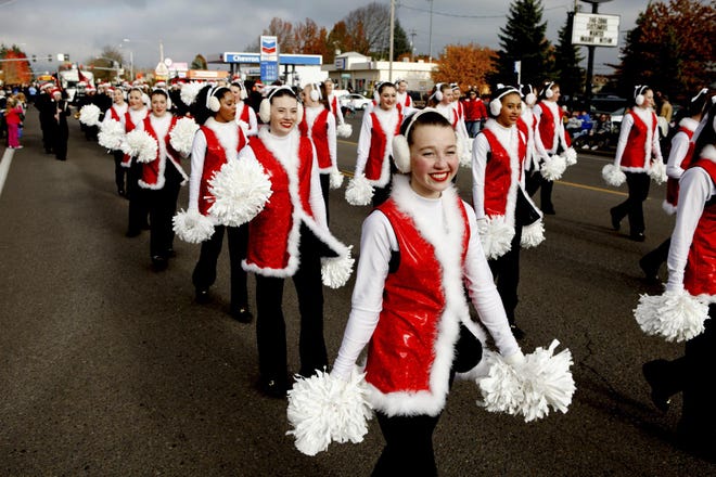 The Springfield Christmas Parade is at 1 p.m. Saturday, Dec. 5. Many community school groups, nonprofits and businesses participate in this annual festive event. (Ivar Vong/For The Register-Guard)