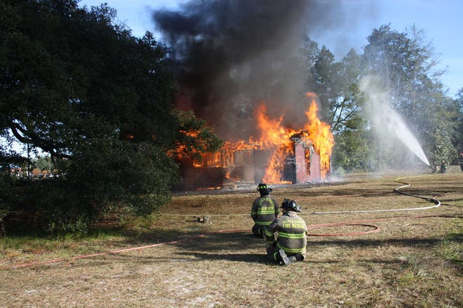 Special to Jasper County Sun Times. The Bedell house went up in flames as Jasper County and Ridgeland firefighters completed live fire training exercises.