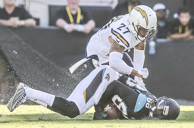 Phelan M. Ebenhack Associated Press Jaguars inside linebacker Hayes Pullard blocks a punt by the Chargers' Mike Scifres during the second half.