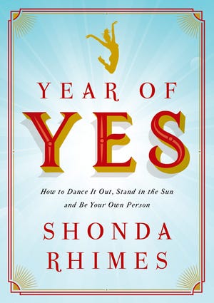 This book cover image released by Simon & Schuster shows "Year of Yes: How to Dance it Out, Stand in the Sun and Be Your Own Person," by Shonda Rhimes. (Simon & Schuster)