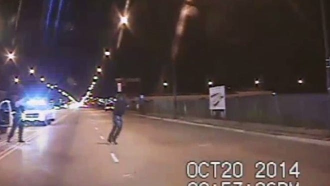 In this still image taken from a police vehicle dash camera released by the Chicago Police Department on Nov. 24, 2015 , Chicago Police Officer Jason Van Dyke is shown shooting Laquan McDonald on Oct. 20, 2014, in Chicago. Van Dyke has been charged with first-degree murder. McDonald was hit with 16 bullets. (Photo by Chicago Police Department via Getty Images)