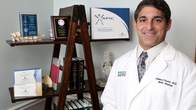 Dr. Guy Scuderi, the founder and president of Cytonics Corporation, stands in his Jupiter office on November 3, 2015. He aims to win FDA approval for a PRP treatment for knee pain, which would allow for insurance coverage of what’s a strictly out-of-pocket procedure. (Richard Graulich / The Palm Beach Post)