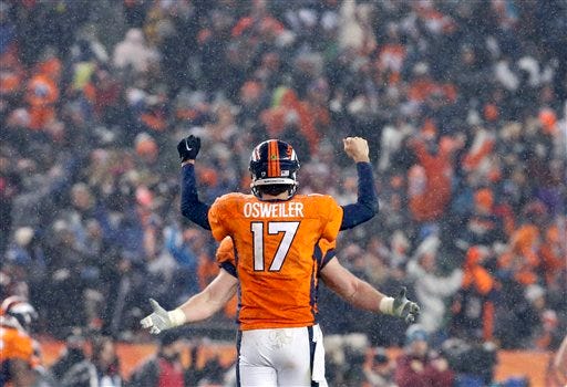 Denver Broncos quarterback Brock Osweiler (17) celebrates the game winning touchdown during overtime of an NFL football game against the New England Patriots, Sunday, Nov. 29, 2015, in Denver. The Broncos defeated the Patriots 30-24. (AP Photo/Joe Mahoney)