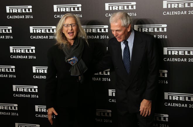 Photographer Annie Leibovitz, shown here with Marco Tronchetti, chairman and chief executive officer of Pirelli, has helmed the the Pirelli Calendar 2016, which features several famous faces. The Associated Press