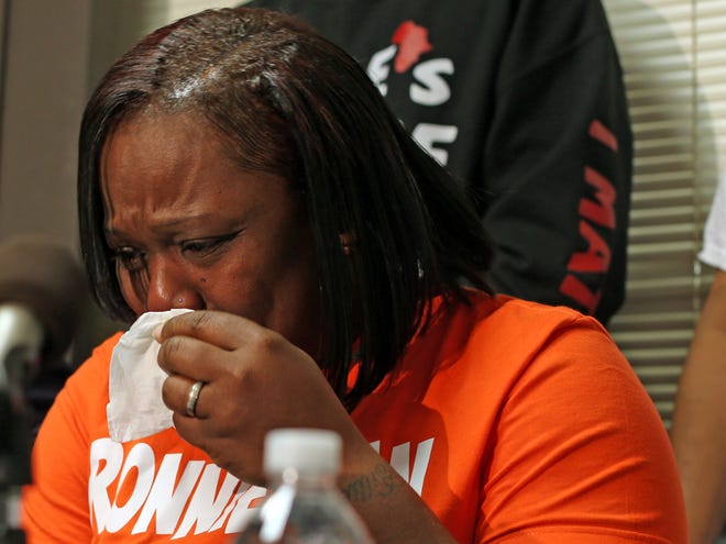 Dorothy Holmes, the mother of 25-year-old Ronald Johnson, speaks at a news conference Tuesday, Dec. 1, 2015, in Chicago, asking that the dash-cam video of her son Ronald being fatally shot by Chicago police on Oct. 12, 2014, be released.