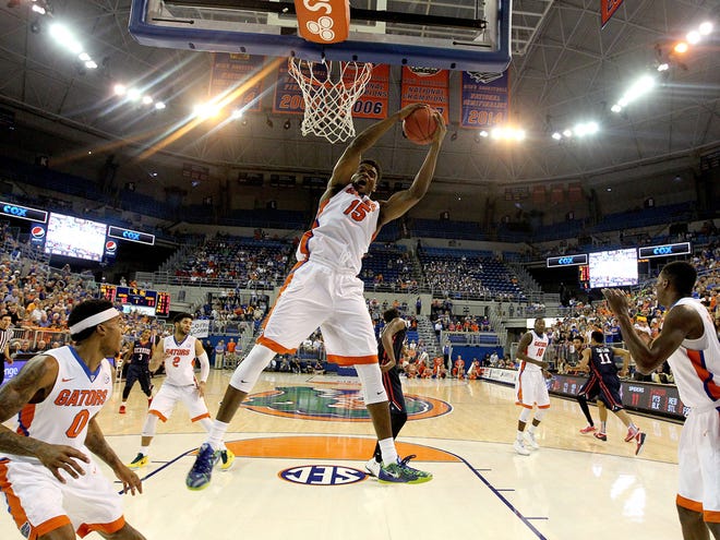 Florida center John Egbunu grabs a rebound against Richmond during the first half Tuesday at the O'Connell Center.