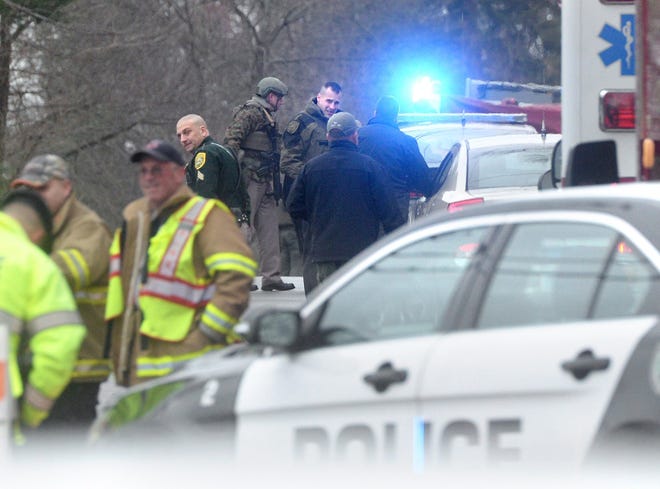 A standoff in Hampton Falls ended with no injuries after a Stratham man turned himself into police custody Tuesday. Until that time, a section of Route 88 in Hampton Falls was closed while N.H. State Police and local officers strategized their positions.

Photo by Deb Cram/Seacoastonline