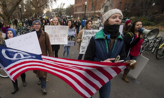 University of Oregon students march on Monday in Eugene in support of accepting Syrian refugees in the United States. (Andy Nelson/The Register-Guard)