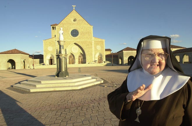 FILE--Mother Angelica, shown Dec. 15, 1999, outside of the Our Lady of the Angels at Adoration Monastery near Hanceville, Ala.k is the founder of the EWTN Network, a worldwide Roman Catholic broadcasting empire based in Alabama.