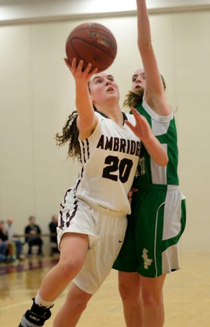 Ambridge's Sydney Rabold drives to the hoop during a game last season.