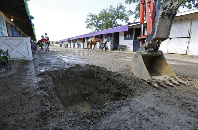 A waterline broke one week before this year's Delaware County Fair, flooding an area north of the grandstand and requiring digging near horse stalls.