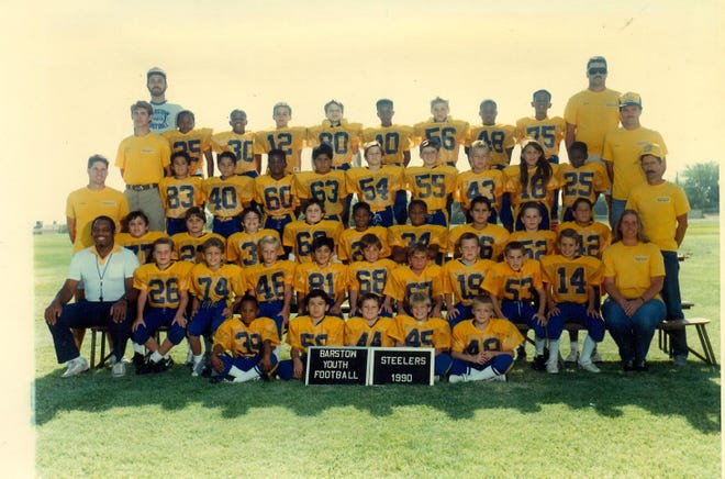 The 1990 Steelers youth football team Al Moss coached. Moss is sitting on the first row at the far left. Photo submitted by Michael Carter