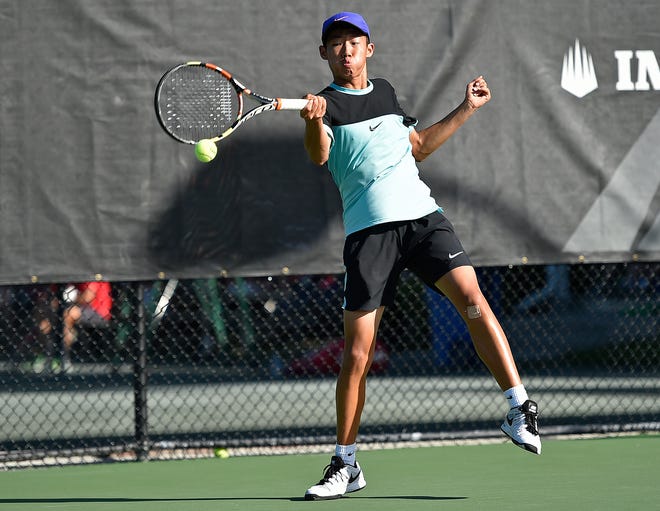Chun Hsin Tseng, 14, of Taiwan, hits a shot during his semifinal round match in the 14-Under Boys Main Draw at the annual Eddie Herr International Tennis Championship at IMG Academy Saturday in Bradenton. STAFF PHOTO / THOMAS BENDER