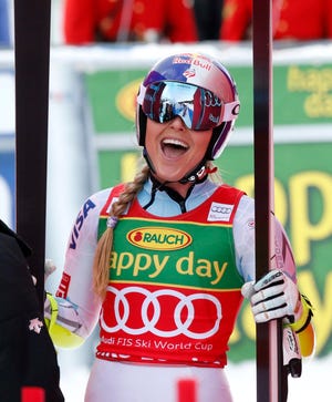 Lindsey Vonn, of the United States, reacts in the finish area following her run at the women's World Cup super-G ski race, in Lake Louise, Alberta, Sunday, Dec. 6, 2015. (Jeff McIntosh/The Canadian Press via AP) MANDATORY CREDIT