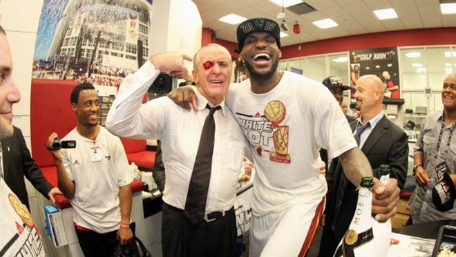 MIAMI, FL - JUNE 20: President of the Miami Heat Pat Riley celebrates with LeBron James #6 of the Miami Heat and his good luck Nike sneaker eyelet after defeating the San Antonio Spurs in Game Seven of the 2013 NBA Finals on June 20, 2013 at American Airlines Arena in Miami, Florida. NOTE TO USER: User expressly acknowledges and agrees that, by downloading and or using this photograph, User is consenting to the terms and conditions of the Getty Images License Agreement. Mandatory Copyright Notice: Copyright 2013 NBAE (Photo by Nathaniel S. Butler/NBAE via Getty Images)