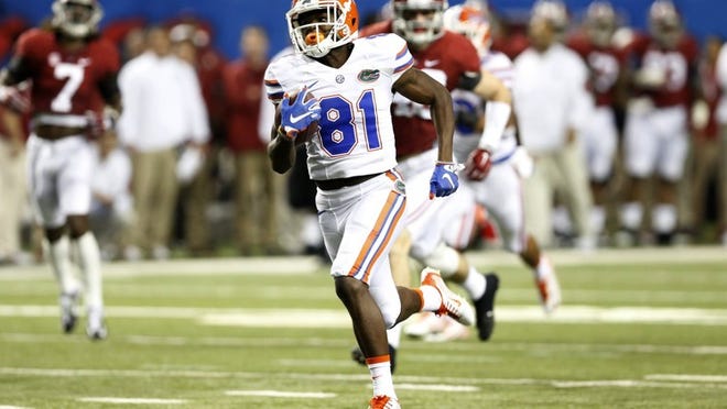 Antonio Callaway #81 of the Florida Gators returns a punt for a second quarter touchdown against the Alabama Crimson Tide during the SEC Championship at the Georgia Dome on December 5, 2015 in Atlanta, Georgia. (Photo by Mike Zarrilli/Getty Images)