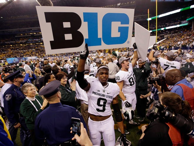 Michigan State's Montae Nicholson (9) celebrates after Michigan State defeated Iowa 16-13 to win the Big Ten championship NCAA college football game Saturday, Dec. 5, 2015, in Indianapolis.