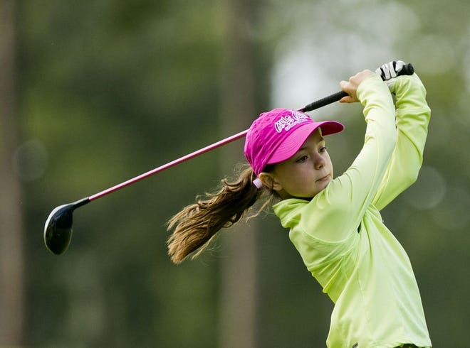 Annalee Regan, 7, competes in the Marion County Junior Golf Tour Championship on Saturday at Ocala Golf Club.