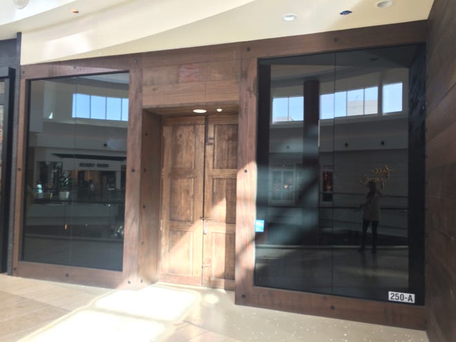The doors of the OndadeMar store in the Mall at University Town Center were closed on Tuesday.