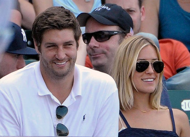 FILE - In this July 2, 2011, file photo, Chicago Bears quarterback Jay Cutler, left, and his wife Kristin Cavallari watch the Chicago Cubs play the Chicago White Sox during an interleague baseball game in Chicago. Utah authorities say the brother-in-law of Cutler has been missing for more than a week after his abandoned car was found running on a remote dirt road with the air bag deployed. Grand County Sheriff Steven White said Monday that a rancher discovered 30-year-old Michael Cavallari's car early on Nov. 27, the day after Thanksgiving. It was found about 200 miles south of Salt Lake City and 5 miles south of Interstate 70. (AP Photo/Brian Kersey, File)