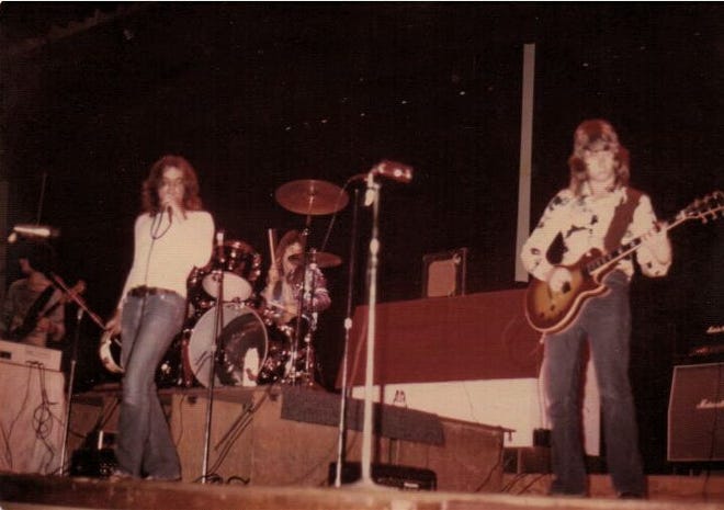 Singer Keith Townsend (left) and guitarist Bobby Fisher, here performing with drummer David Usoikkinen in the band the Kooks in 1973, are together again as Mr. Peabody, which consists of four longtime Levittown-area musicians.