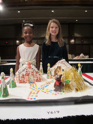 Julia Belle Fair and Trinity White with their entry for the National Gingerbread Competition.