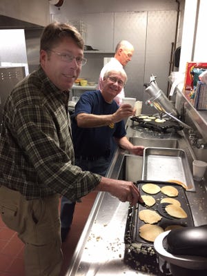 The Clinton Area Rotary Club held its annual pancake breakfast at Clinton Elementary School on Sunday. Among the many guests was Santa Claus. Pictured, cooking up some pancakes, are (from left) Club President Mike Volmar, Dave Dunn and Daryl Wickman. The winner of the $10,000 Super Raffle was Mike Preston, of Holden.