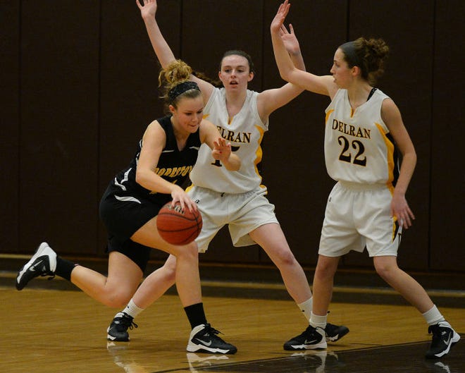 Delran's Brenna Cloud (center) has worked to improve and her game in the off season as she returns to lead the Bears.