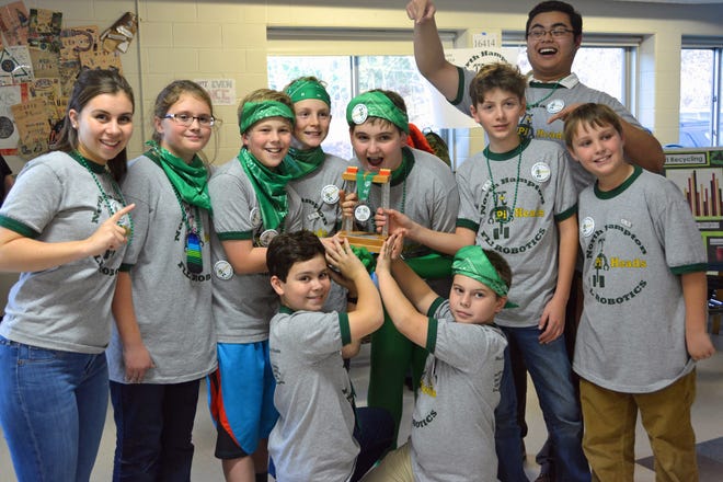 The 8-member Pi-Heads, comprised of sixth-grade NHS students, walked away with the coveted “Gracious Professionalism” award at the statewide Lego Robotics competition held on Dec. 5. Courtesy photo
