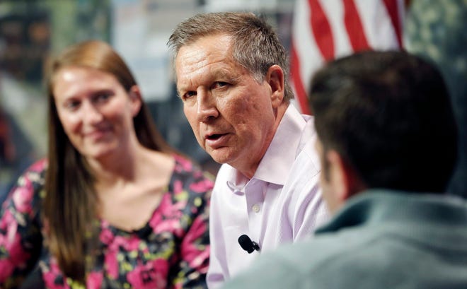In this Dec. 10, 2015, photo, Republican presidential candidate, Ohio Gov. John Kasich speaks during a campaign stop with young professionals in Manchester, N.H. The Republican establishment has flexed its muscle in New Hampshireís presidential primaries for years. But in the unpredictable 2016 election, the stateís standard political playbook faces challenges on two fronts. Kasich is competing most directly for support with New Jersey Gov. Chris Christie, former Florida Gov. Jeb Bush and Florida Sen. Marco Rubio. (AP Photo/Jim Cole)