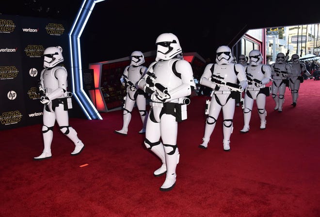 Stormtroopers march on the red carpet at the world premiere of "Star Wars: The Force Awakens" at the TCL Chinese Theatre on Monday in Los Angeles.