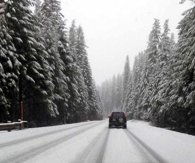 Snow conditions on Highway 126 near Clear Lake on Saturday, Dec. 12, 2015. (Junnelle Hogen/The Register-Guard)