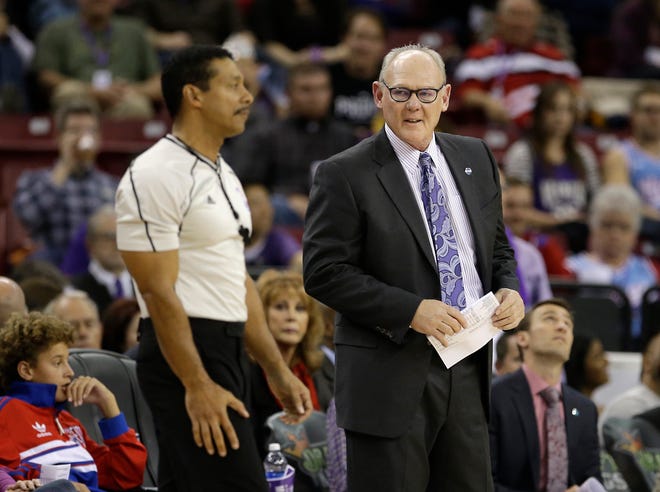 Sacramento Kings head coach George Karl talks with official Bill Kennedy during the second half of an NBA basketball game against the Minnesota Timberwolves, Friday, Nov. 27, 2015, in Sacramento, Calif. The Timberwolves won 101-91. (AP Photo/Rich Pedroncelli)