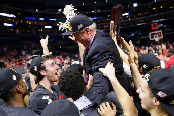 In this Saturday, March 28, 2015 file photo, Wisconsin players lift up head coach Bo Ryan as they celebrate their 85-78 win over Arizona in a college basketball regional final to advance to the Final Four in the NCAA Tournament in Los Angeles. Ryan said on Monday, June 29, that he will retire after one more season with the Badgers.