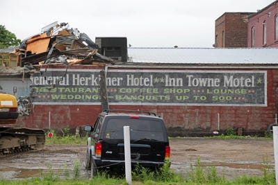 FILE - Demolition of the vacant Glory Days building in Herkimer on Tuesday, June 16.