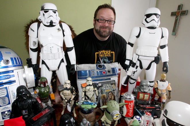 For 'Star Wars' memorabilia fans like Charlie West, 'the thrill of the hunt' is the thing, and local stores hope the thrill brings buyers. Story, A8. 
News-Journal/LOLA GOMEZ