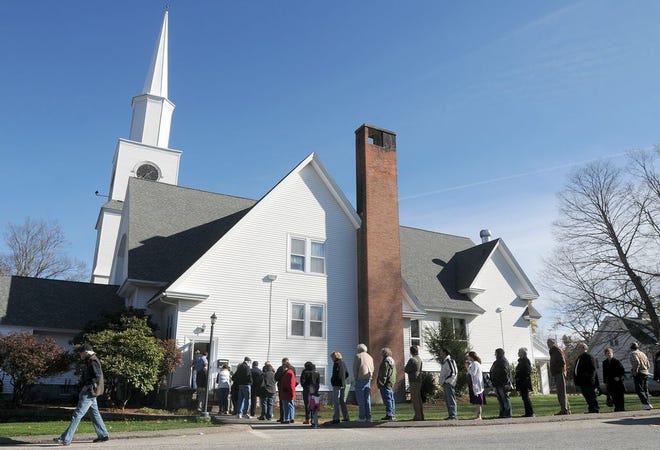 On Nov. 6, 2012, a long line of voters formed outside First Congregational Church along Pleasant Street in Worcester, a polling site. T&G File Photo