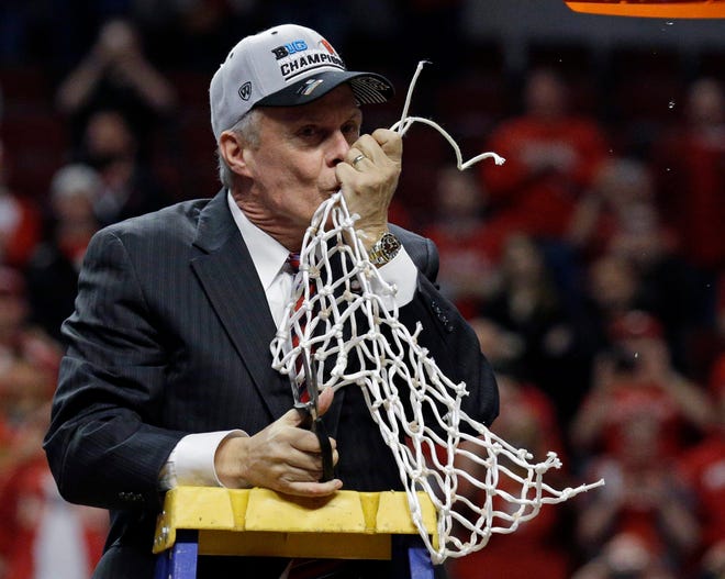 Wisconsin coach Bo Ryan kisses the net after the Badgers won the Big Ten men's college basketball tournament in Chicago on March 15. The Associated Press