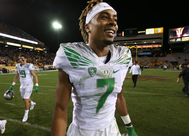 Oregon's Darren Carrington is all smiles as he leaves Sun Devil Stadium after a triple overtime win over Arizona State. (Chris Pietsch/The Register-Guard)