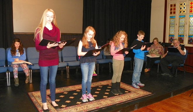 Brooke Greening, Kelsey Clarke, Julia Hawthorne, Jack Greening rehearse a scene from "The Gift of the Magi and Other Christmas Stories and Verse." PAT DE MONO/FOR THE GAZETTE