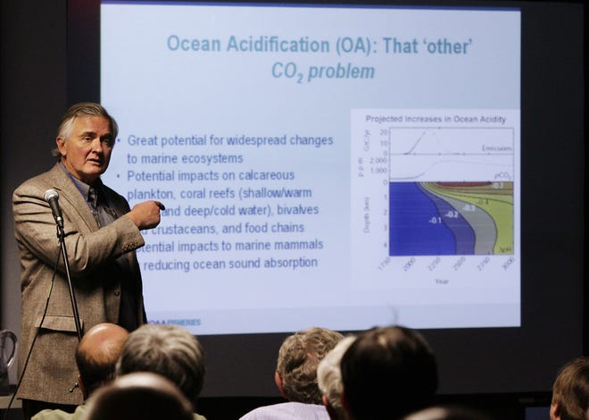 John Bullard, Northeast regional administrator for NOAA Fisheries, describes the threat of ocean acidification during a recent program in New Bedford. Mike Valeri/ Standard-Times file photo