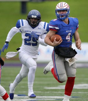 In this Nov. 28, 2015, photo, Austin Westlake football player Sam Ehlinger (4) scrambles in front of North Mesquite's Dillon Owens (25) during a Class 6A Division I regional playoff game in Waco, Texas. Sam Ehlinger has a chance to achieve something only Drew Brees did before him: lead Austin Westlake to a Texas football championship. Ehlinger is also the first junior to win the Texas Associated Press Sports Editors player of the year award announced Friday, Dec. 18, 2016 . (Stephen Spillman/Austin American-Statesman via AP) AUSTIN CHRONICLE OUT, COMMUNITY IMPACT OUT, INTERNET AND TV MUST CREDIT PHOTOGRAPHER AND STATESMAN.COM, MAGS OUT; MANDATORY CREDIT