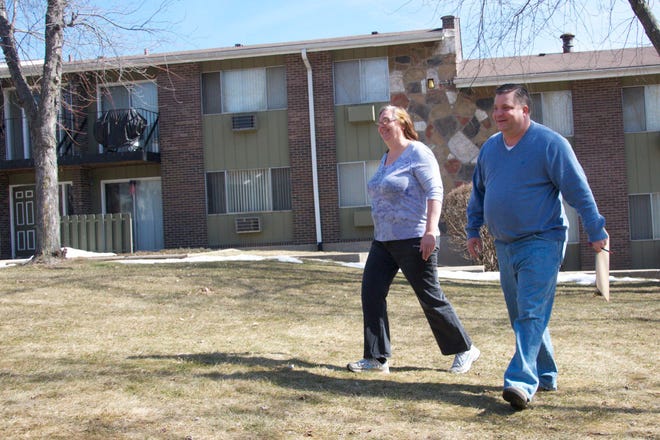 Alpine Chalet owner Jeff Sturtecky, who accepts Section 8 vouchers, walks through the apartment complex with manager Mary Beth Mengelt on Thursday, March 12, 2015. RRSTAR.COM FILE PHOTO