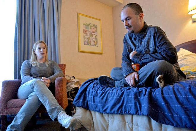 Homeless families discuss their living situation at Best Western Hotel in Chelmsford. Caley McGuane /The Lowell Sun via AP