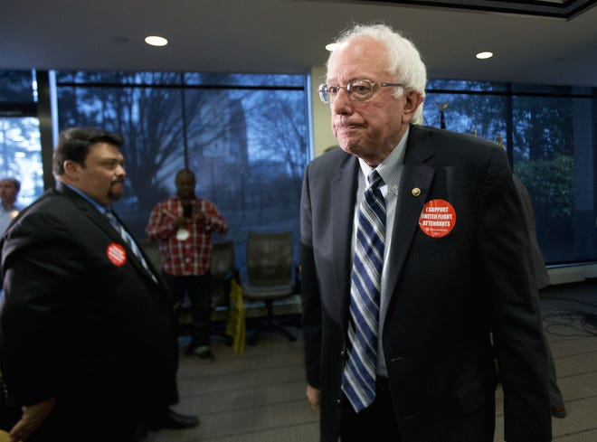 Democratic presidential candidate Bernie Sanders leaves a news conference where he was endorsed by members of the Communication Workers of America onThursday. The Associated Press