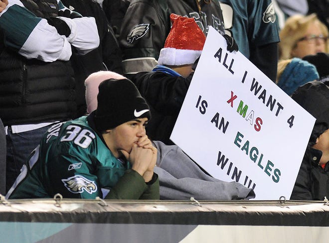 A fan intently watches the action during the Eagles' game with the Cardinals at Lincoln Financial Field on Sunday, Dec. 20, 2015. The Eagles lost 40-17.