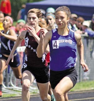Dominique Twombly of Oyster River High School, shown competing during outdoor track in the spring, won the 55-meter dash as the Bobcats won their first indoor meet of the season Sunday at UNH. File photo