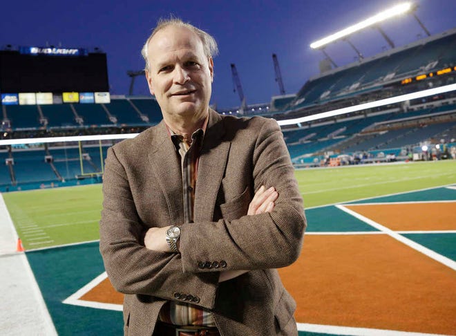 In this Dec. 14, 2015, photo, Steve Hirdt is seen at his 501st Monday night football game, between the Miami Dolphins and the New York Giants, in Miami Gardens, Fla. Hirdt is the statistical eyes and ears of the operation, a walking encyclopedia of sorts from the Elias Sports Bureau who plays an essential role in the league's signature broadcast. (AP Photo/Lynne Sladky)