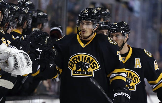 Boston's Loui Eriksson celebrates his first period goal against the Devils on Sunday night.